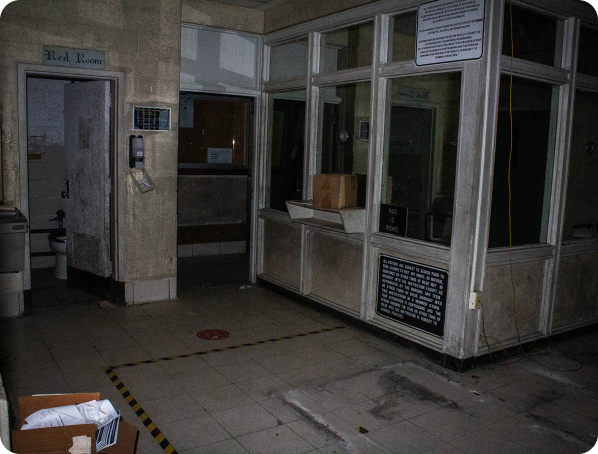 Inside of the lobby of an abandoned pre-release center